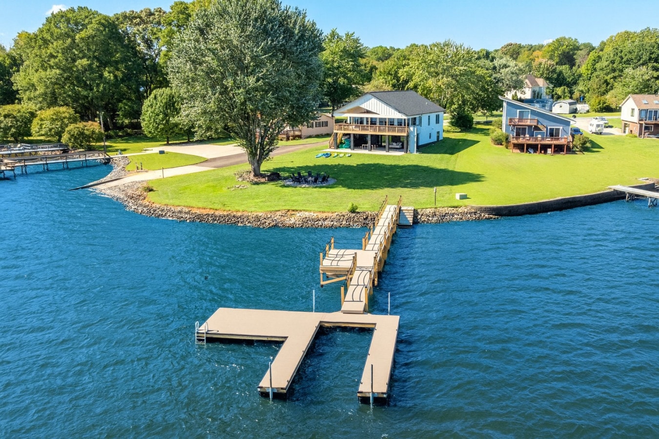 Warm lake house living room with a water view